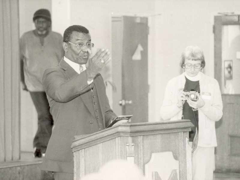 Anne Braden and an African American man speaking to crowd