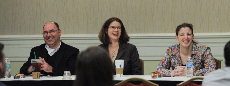 Photograph of professors Tony Arnold, Jamie Abrams and JoAnne Sweeny speaking as panelists at the National Conference of Law Reviews.