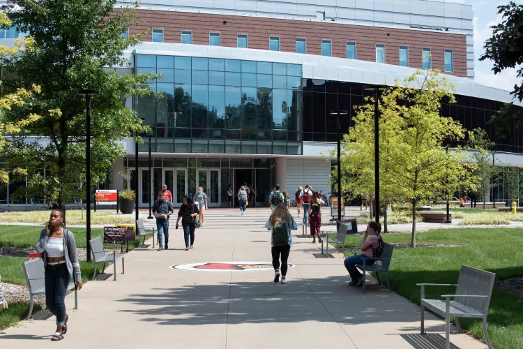 Students walking outside of the Belknap Academic Building