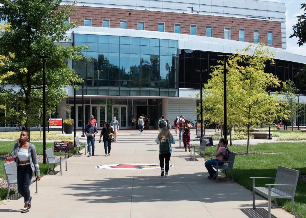 Students walking outside of the Belknap Academic Building