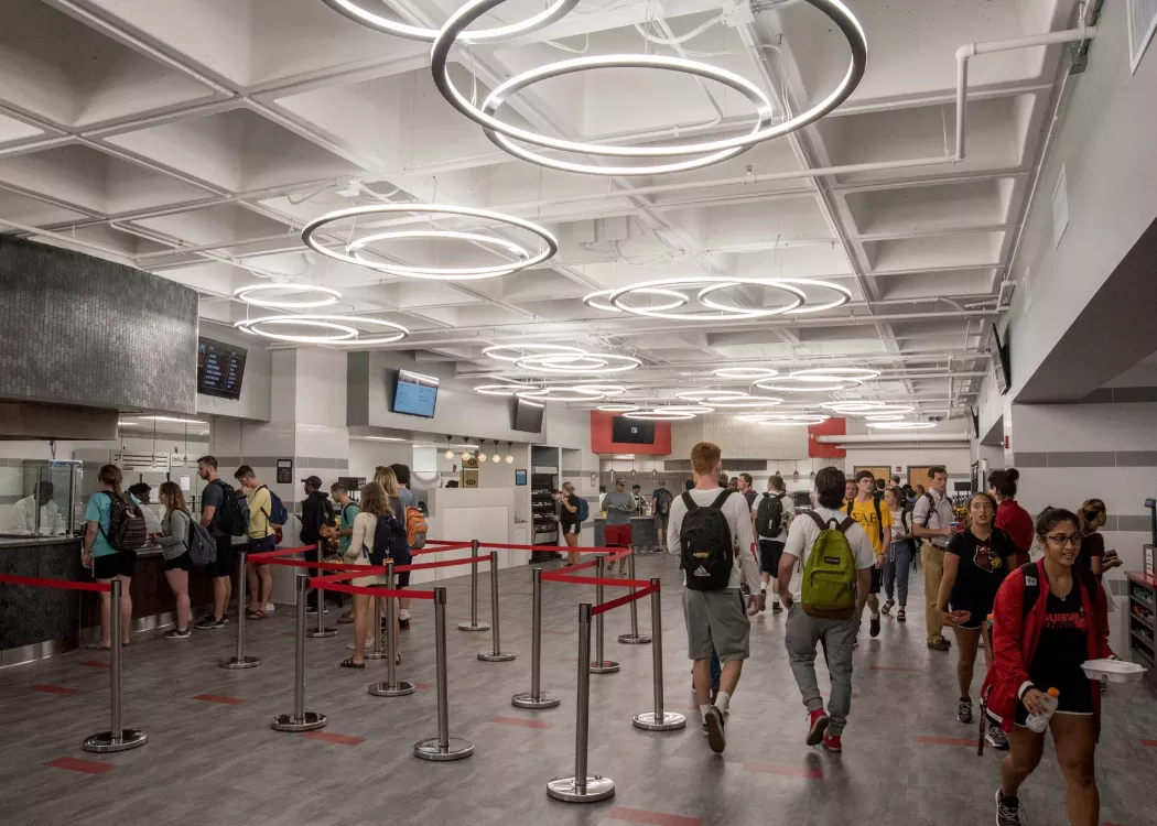 Students wait in line for food at the newly developed SAC food area