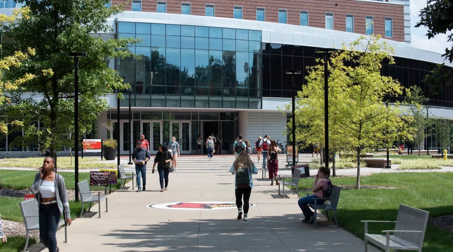 Students walking outside of the Belknap Academic Building
