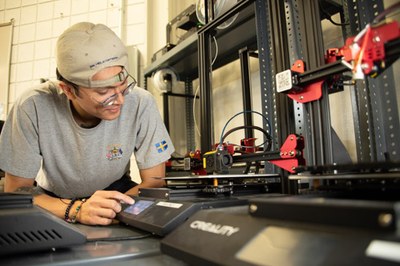 Jack, co-op student, leveling the build plate to begin the FFF 3D print process.