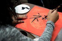 woman writing mandarin