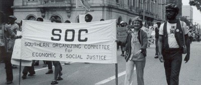 Anne Braden marching in a protest rally