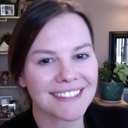 Heather Brook Adams, a white woman who is here pictured in her office. Heather Brook Adams