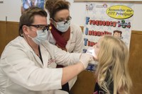 Children receive free dental screenings and oral health education 
