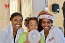 Dental and dental hygiene students help brighten the holidays for local underserved children 
