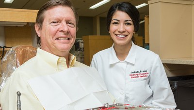 Image of patient and faculty at the University of Louisville School of Dentistry