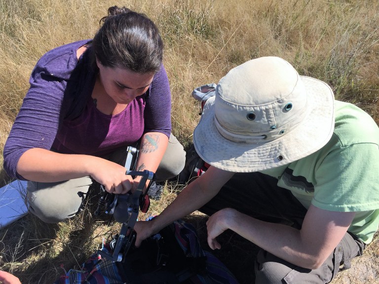 Ariel Weaver and Dr. Forrest Stevens prepare a UAS for flight operations in Africa