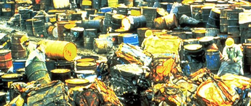 Workers in hazardous material suits wade through toxic waste at the Valley of the Drums in Bullitt County, near Louisville.