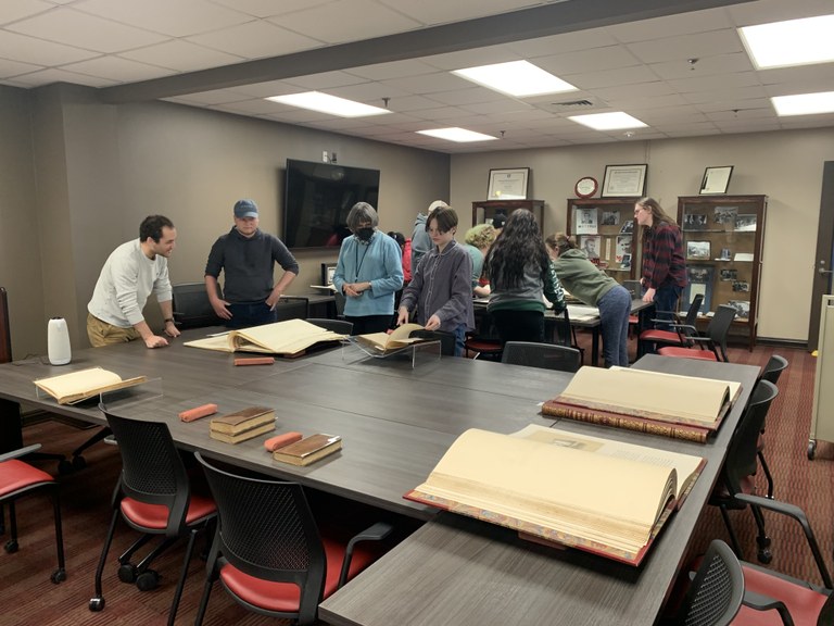 Students in Dr. Westerfeld's course Egypt in the Western Imagination examine 19th-century publications on Egypt from the University's Rare Books Collection.