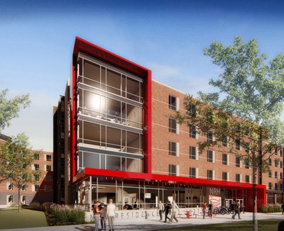 exterior of new residence hall 2021. brick, four stories, red trimming, large windows