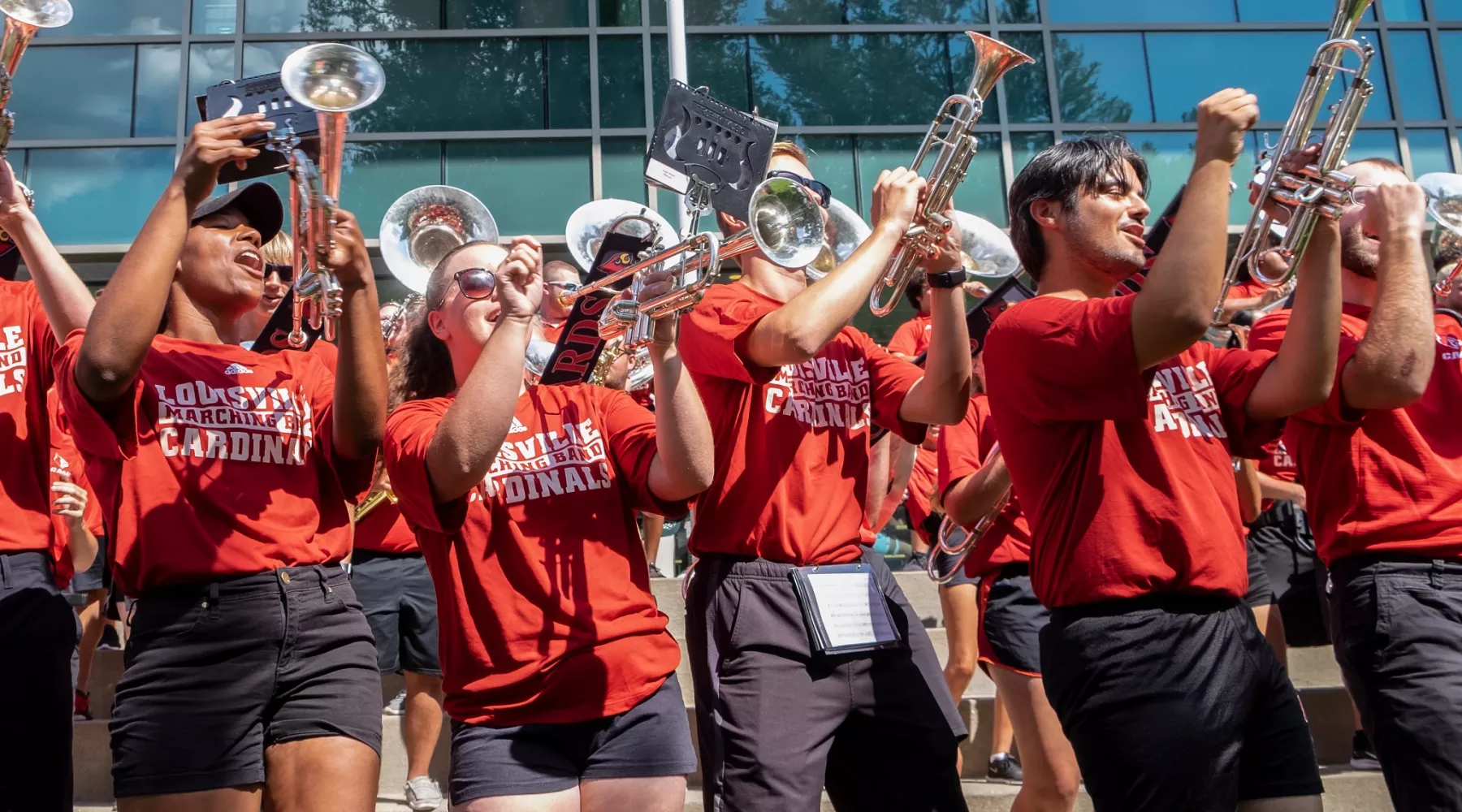Members of Cardinal Marching Band at the Alumni Picnic during Welcome Week.
