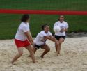 image of student playing sand volleyball 