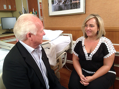 Dr. Schapmire talks with a patient Dr. Schapmire talks with a patient