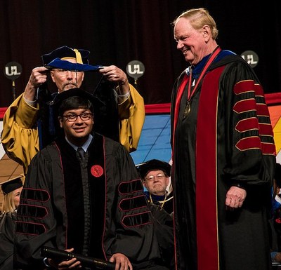 Venkat bending down for hooding