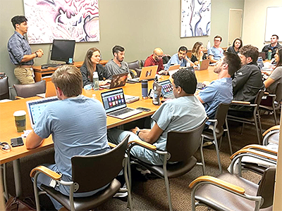 Residents in weekly conference