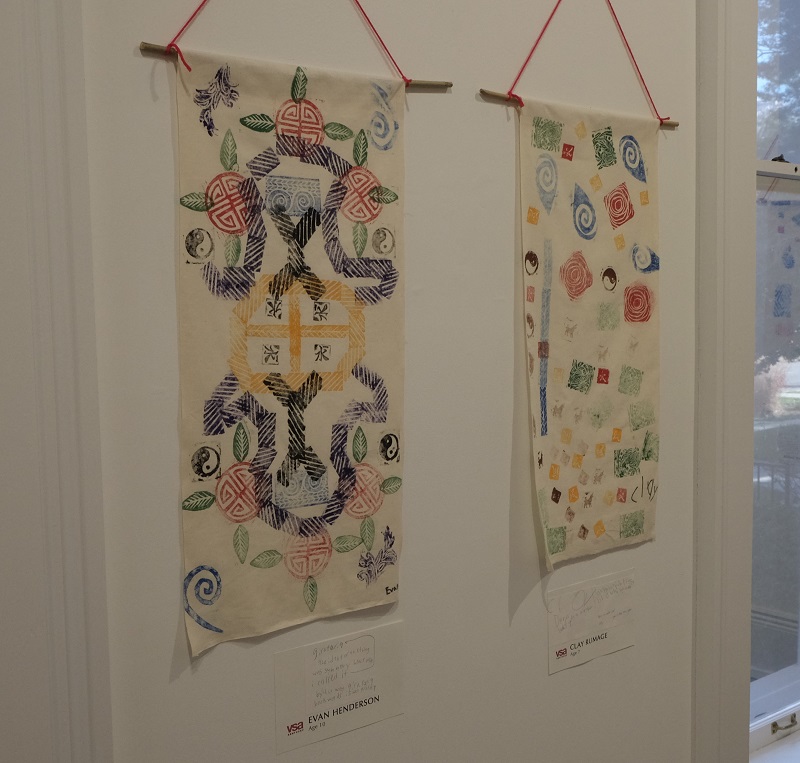 Two of the students' scrolls on display