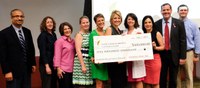 Twisted Pink donates $100,000 to UofL’s James Graham Brown Cancer Center