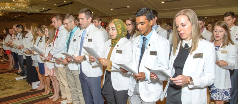 Future doctors receive their first white coat at UofL