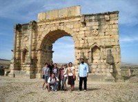 Group in front of architectural ruins