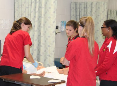 Nursing students practicing skills