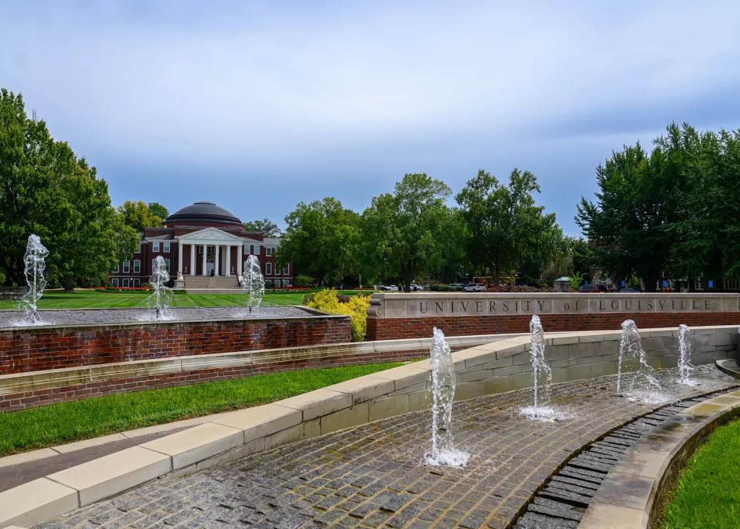 Exterior view of Grawemeyer Hall with the 3rd Street entrance and fountains in view