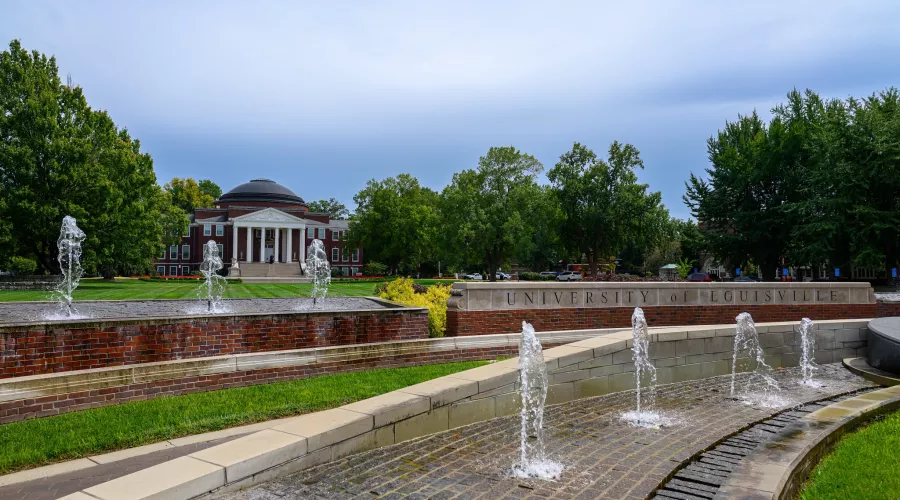 Exterior view of Grawemeyer Hall with the 3rd Street entrance and fountains in view