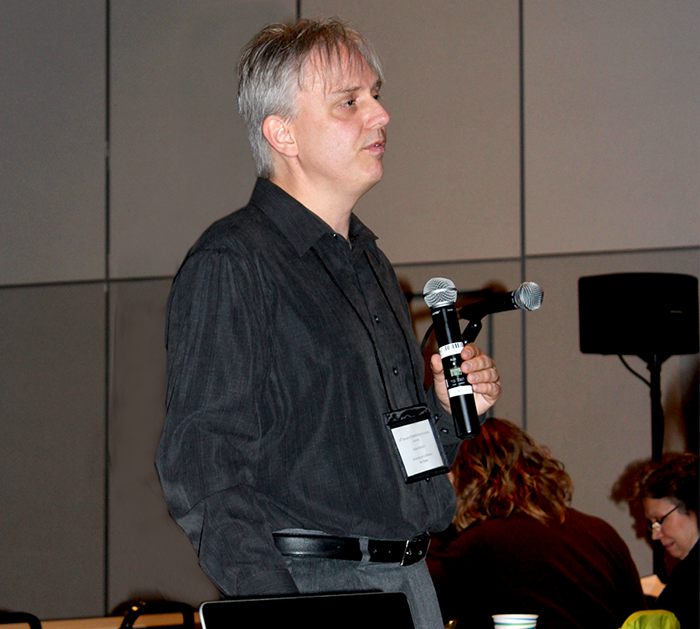 Image of student at the end of program poster session