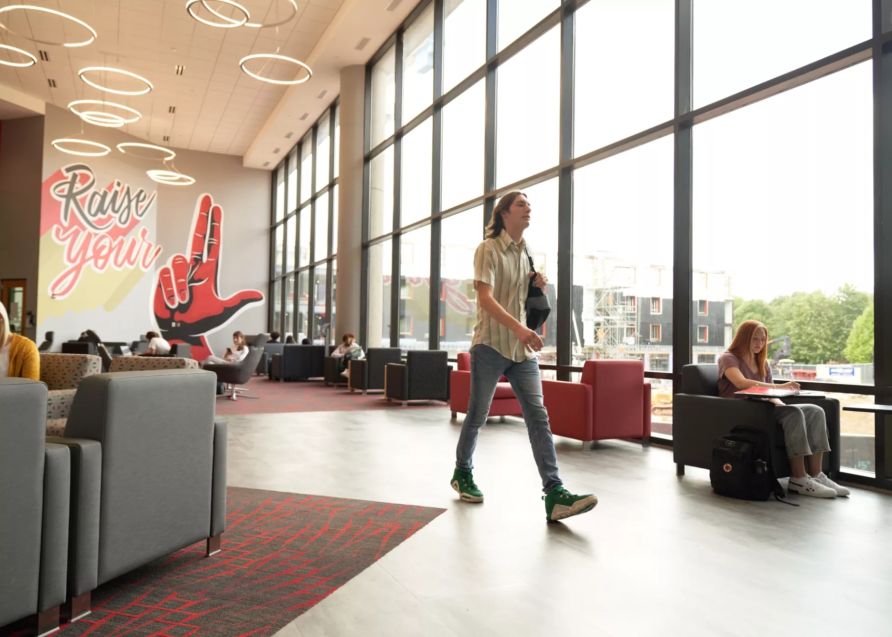 Student walking through the Student Activities Center.