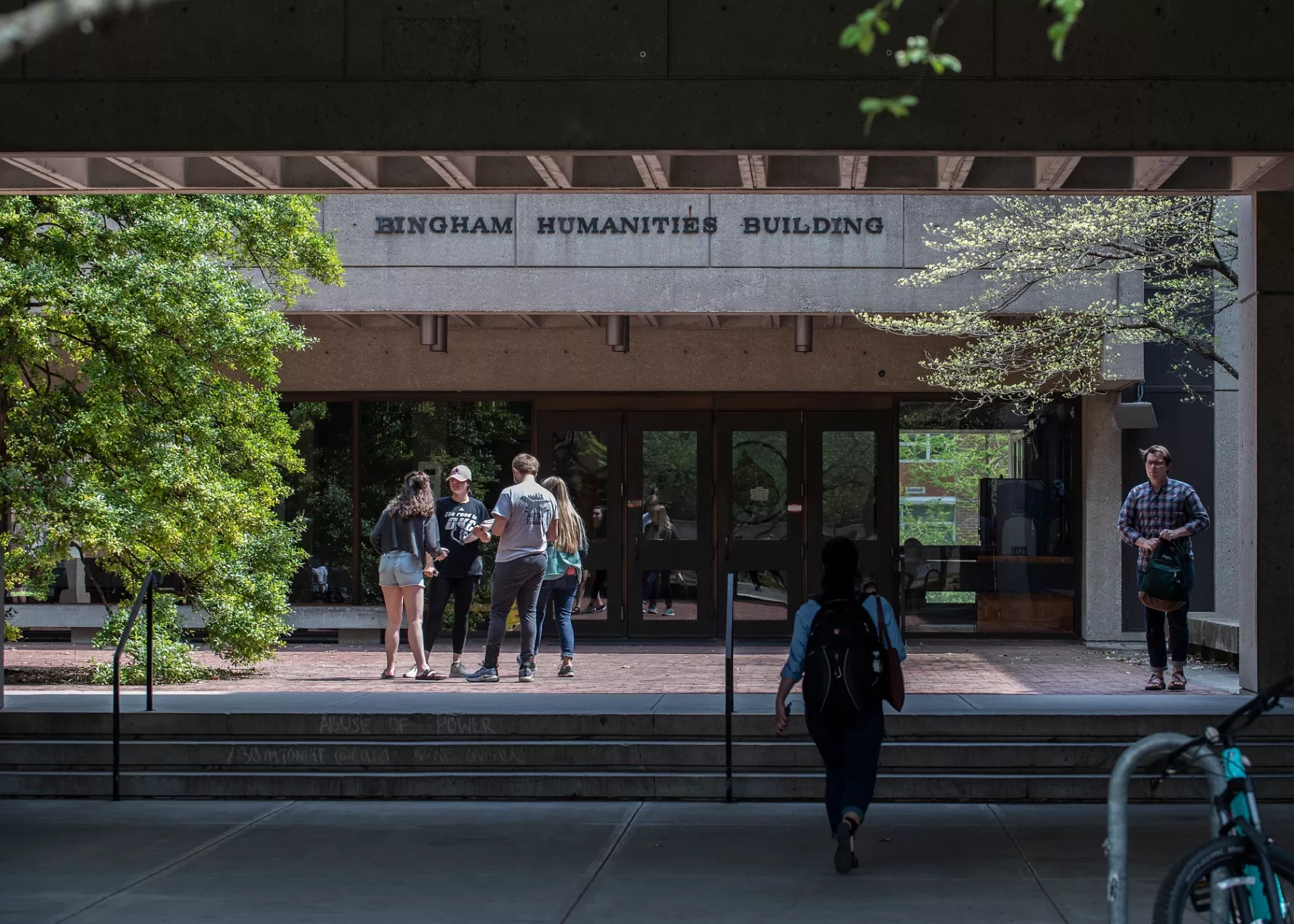 Bingham Humanities Building exterior with students