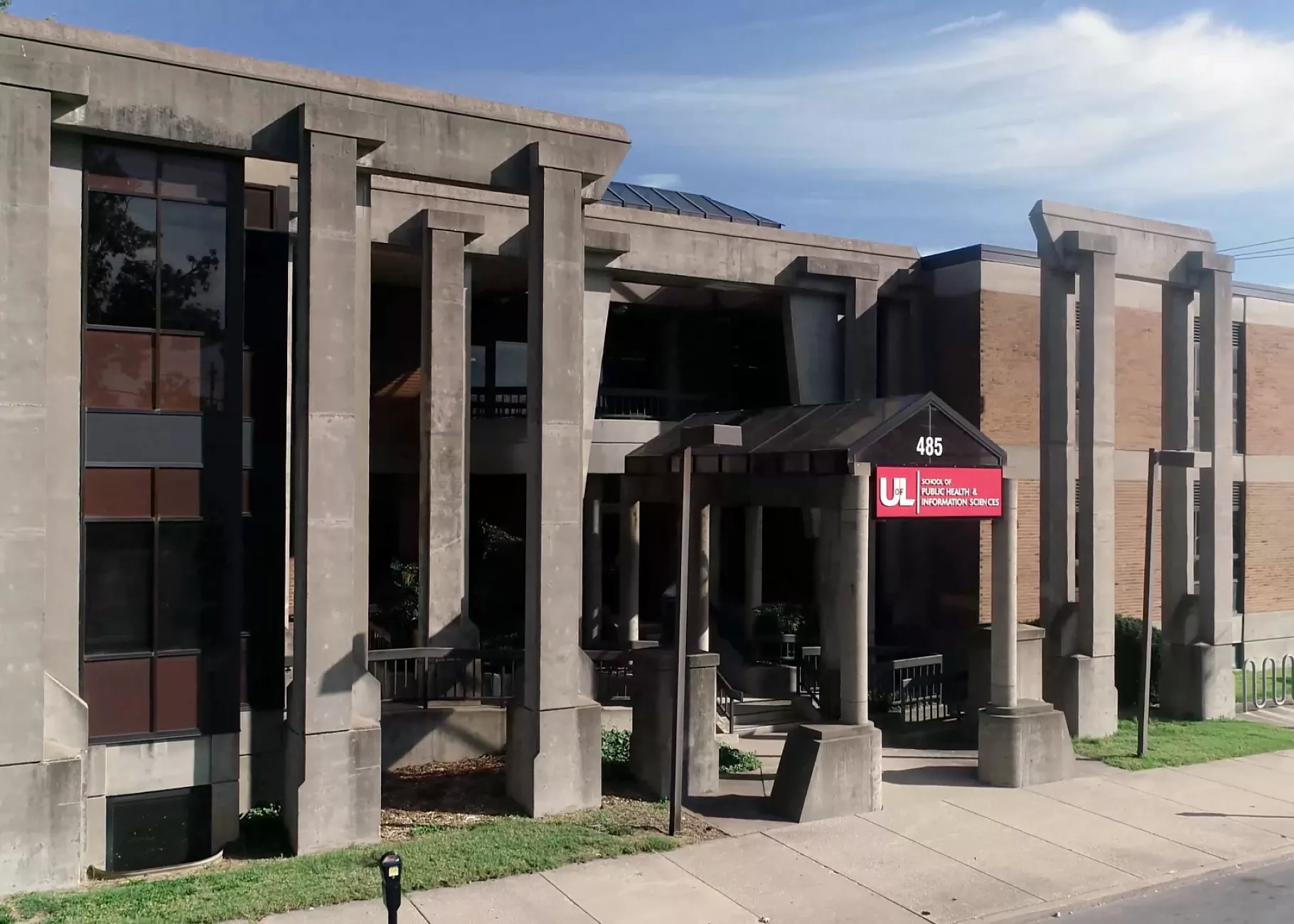 Still image from a drone video of the exterior of the School of Public Health & Information Sciences