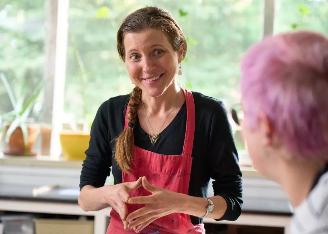 Rachel Singel, Associate Professor teaching a printmaking studio course