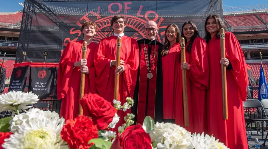 President Bradley with a group of students
