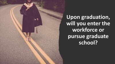 Image of graduate standing in road