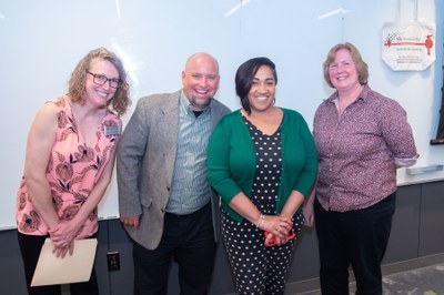 15th Anniversary Celebration March 2023 - Marian Vassar receives award from Jessica Eggleston, Justin Mog & Gail DePuy