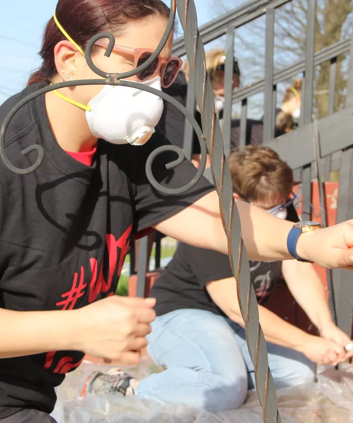 Painting a home on Cardinal Day of Service